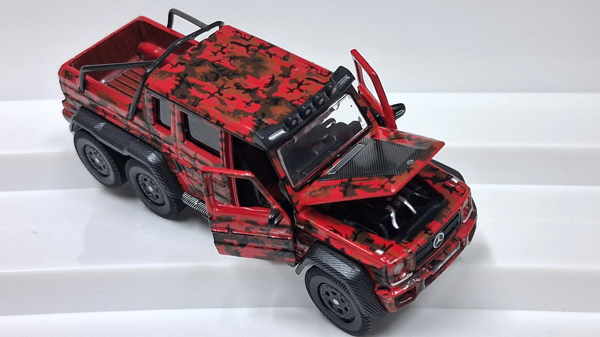 Mercedes Benz - G63 AMG | 6×6 Marine/Flame camouflage 1:64 ERA CAR