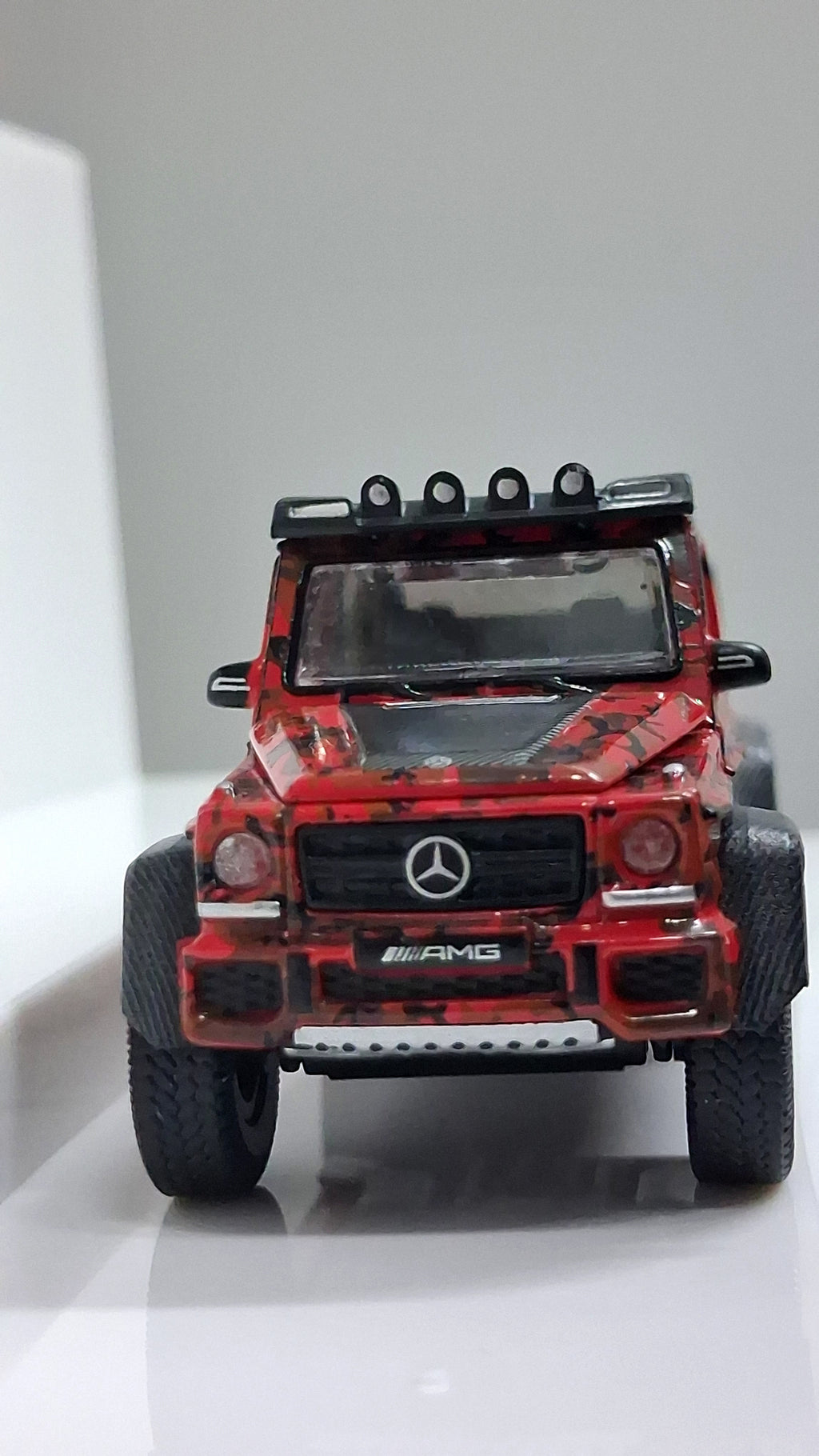 Mercedes Benz - G63 AMG | 6×6 Marine/Flame camouflage 1:64 ERA CAR