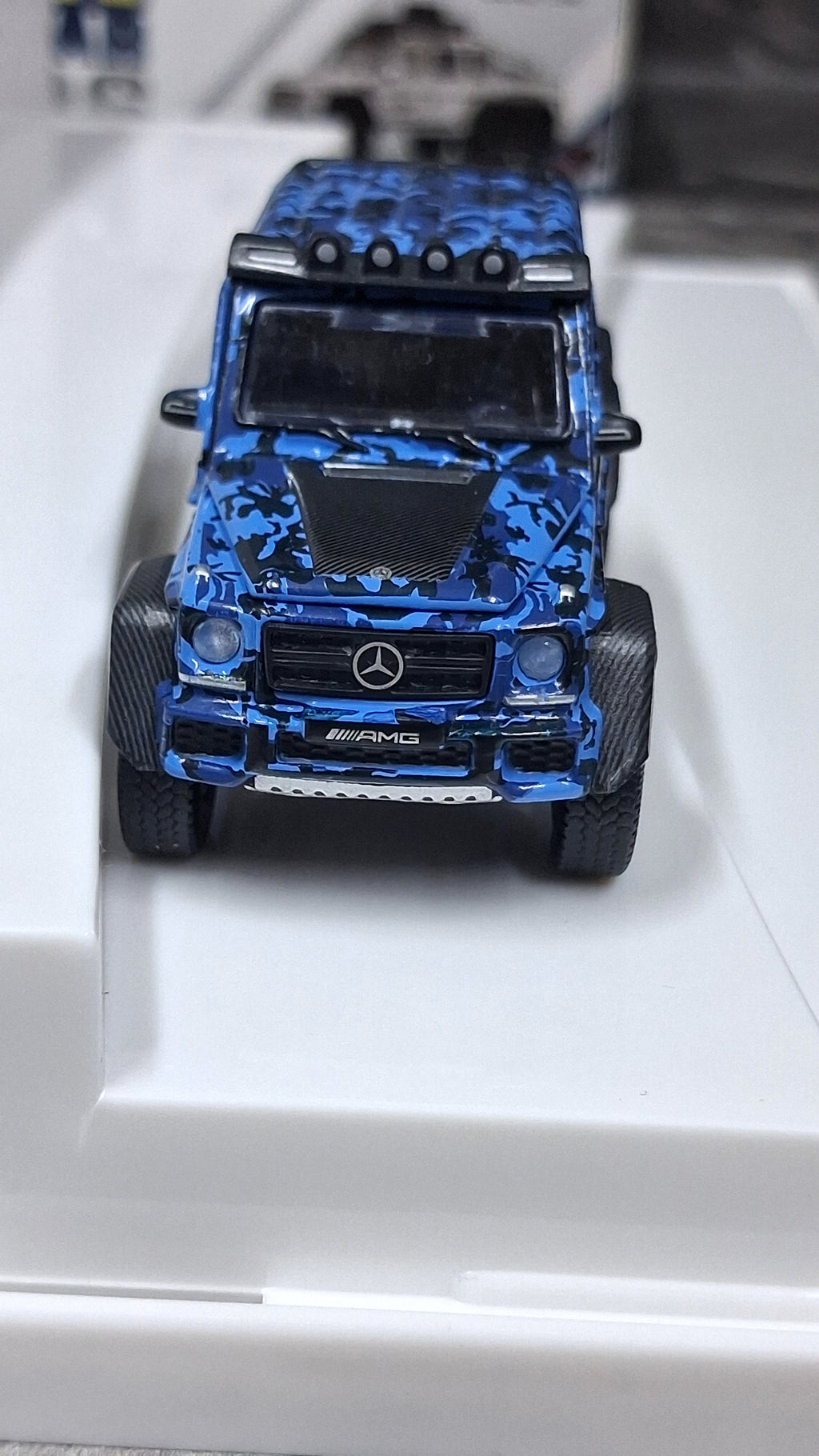 Mercedes Benz - G63 AMG | 6×6 Marine/Flame camouflage 1:64 ERA CAR
