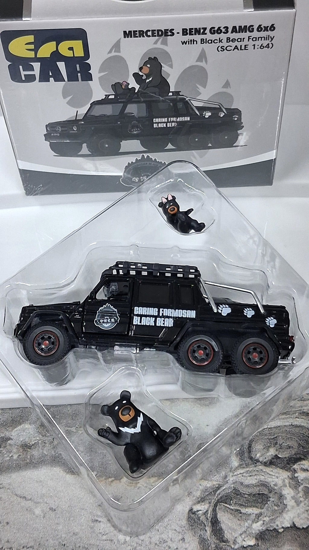 Mercedes Benz - G63 AMG | 6×6 with black bear family 1:64 ERA CAR